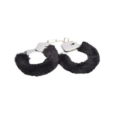 a pair of black furry handcuffs on a white background